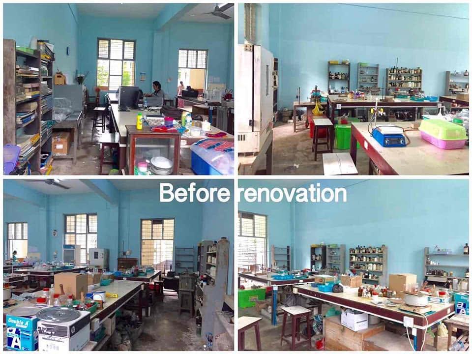 The Micro Lab before renovation — rows of worn timber benches with glassware, reagent bottles and old equipment throughout the room